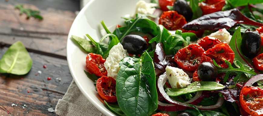 Sun dried tomatoes Salad with fresh vegetables mix and mozzarella cheese